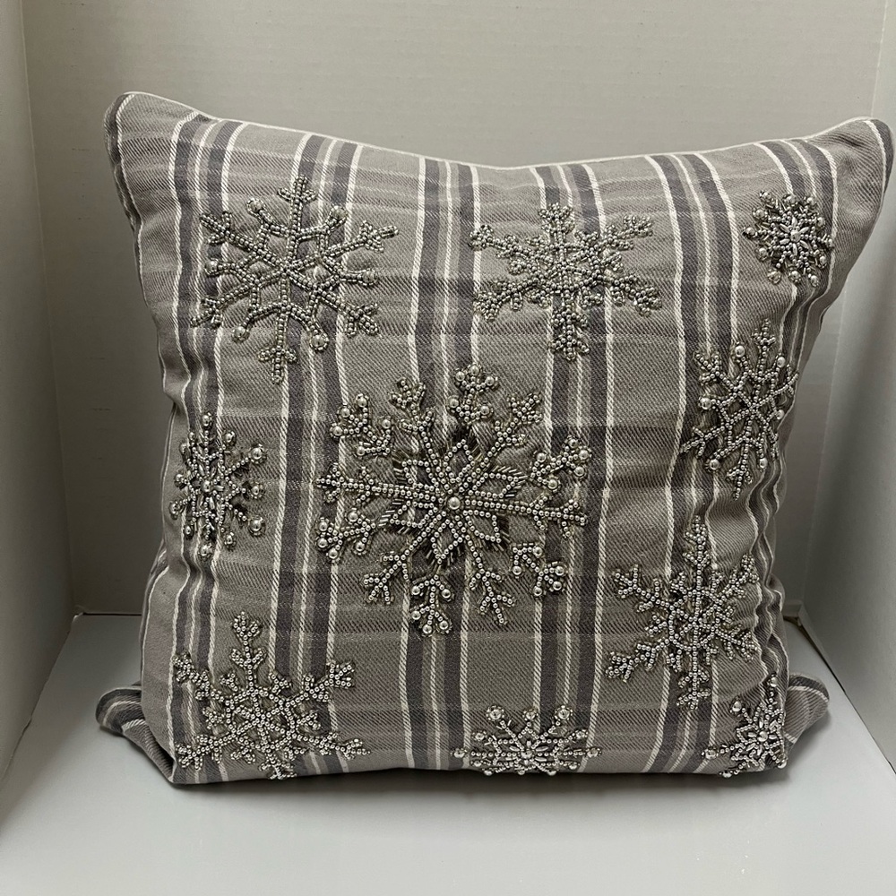 Tan plaid embellished, snowflake pillow.